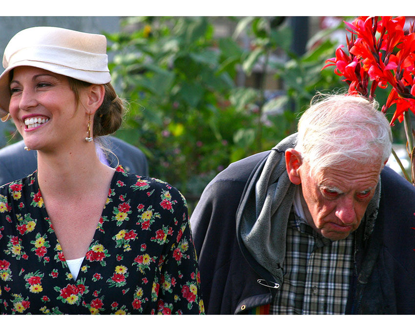 A young woman and an old man.