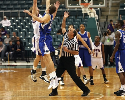 Basketball players on field.