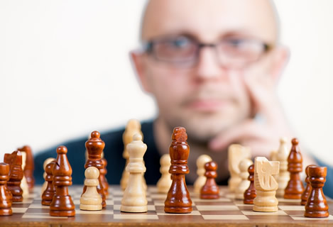 Person playing chess.