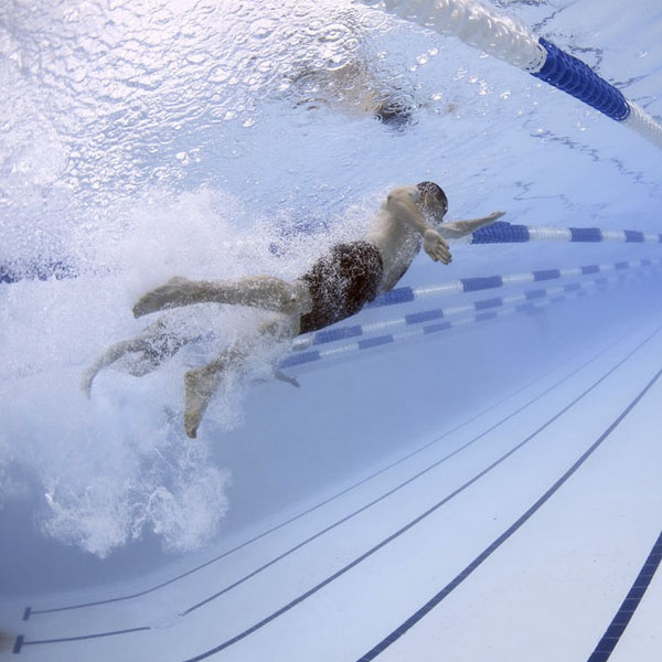 Guy swimming.