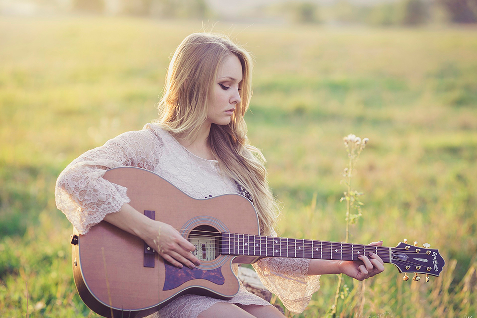 Girl playing the guitar