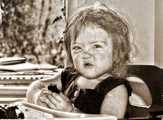 Girl disgusted by the flavor of the cookies